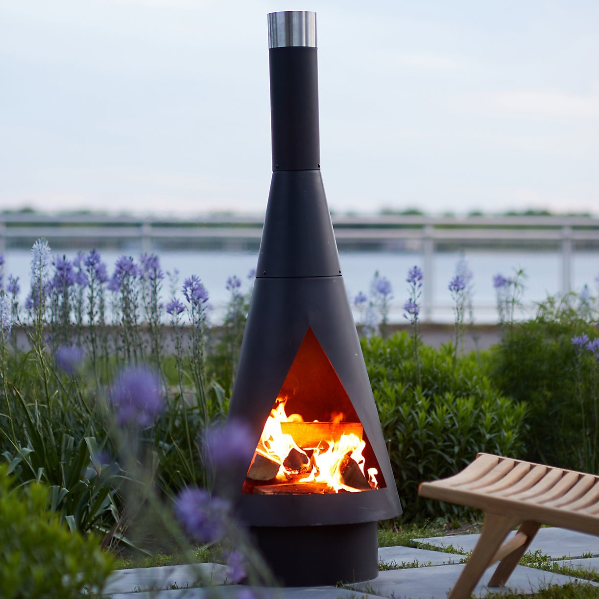 Terrain Angled Obelisk Chiminea - Go up with this elevated, geometric chiminea. Welded from a single piece of weathering steel, this timeless wood-burning outdoor fireplace will develop a beautiful patina over time. SHOP NOW >