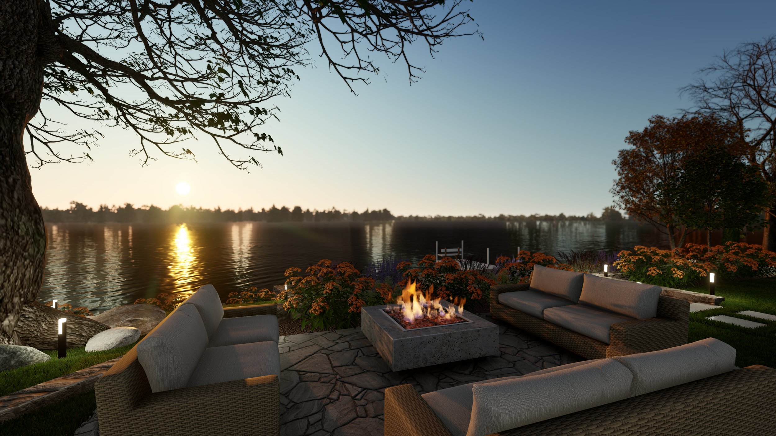 Lakeside outdoor stone patio with three Abaco Sofas and square fire pit at sunset.