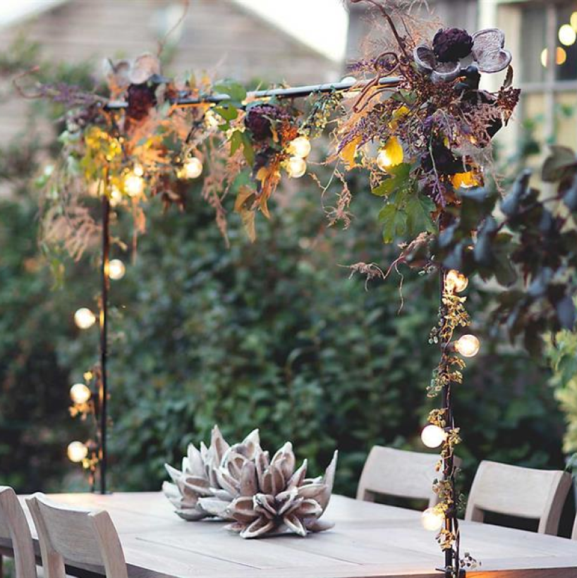 03                       Over-The-Table Rod - Decorate your outdoor table with seasonal decor from the garden using an over-the-table rod from Terrain. This brilliant tabletop addition is lightweight and inexpensive, and yet, makes a huge visual impact.SHOP NOW >