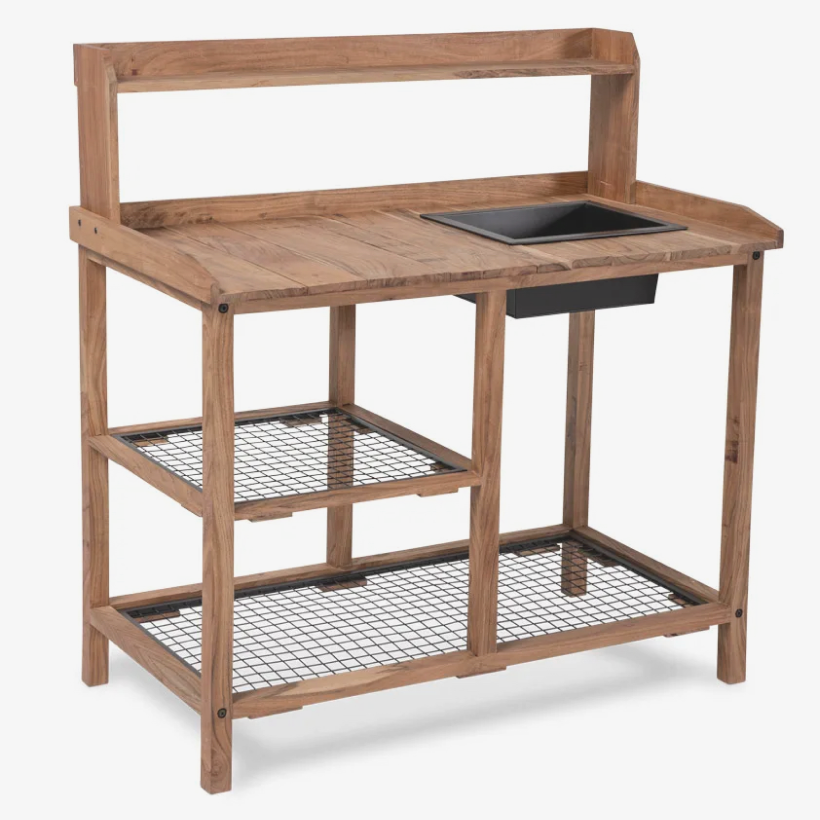 04                     Acacia Potting Bench - We love potting tables for both their form and function. A high-quality, wood piece will last outside for years and offers endless opportunities for decoration and displaying your favorite outdoor decor (plus, potting your plants, of course!).SHOP NOW >
