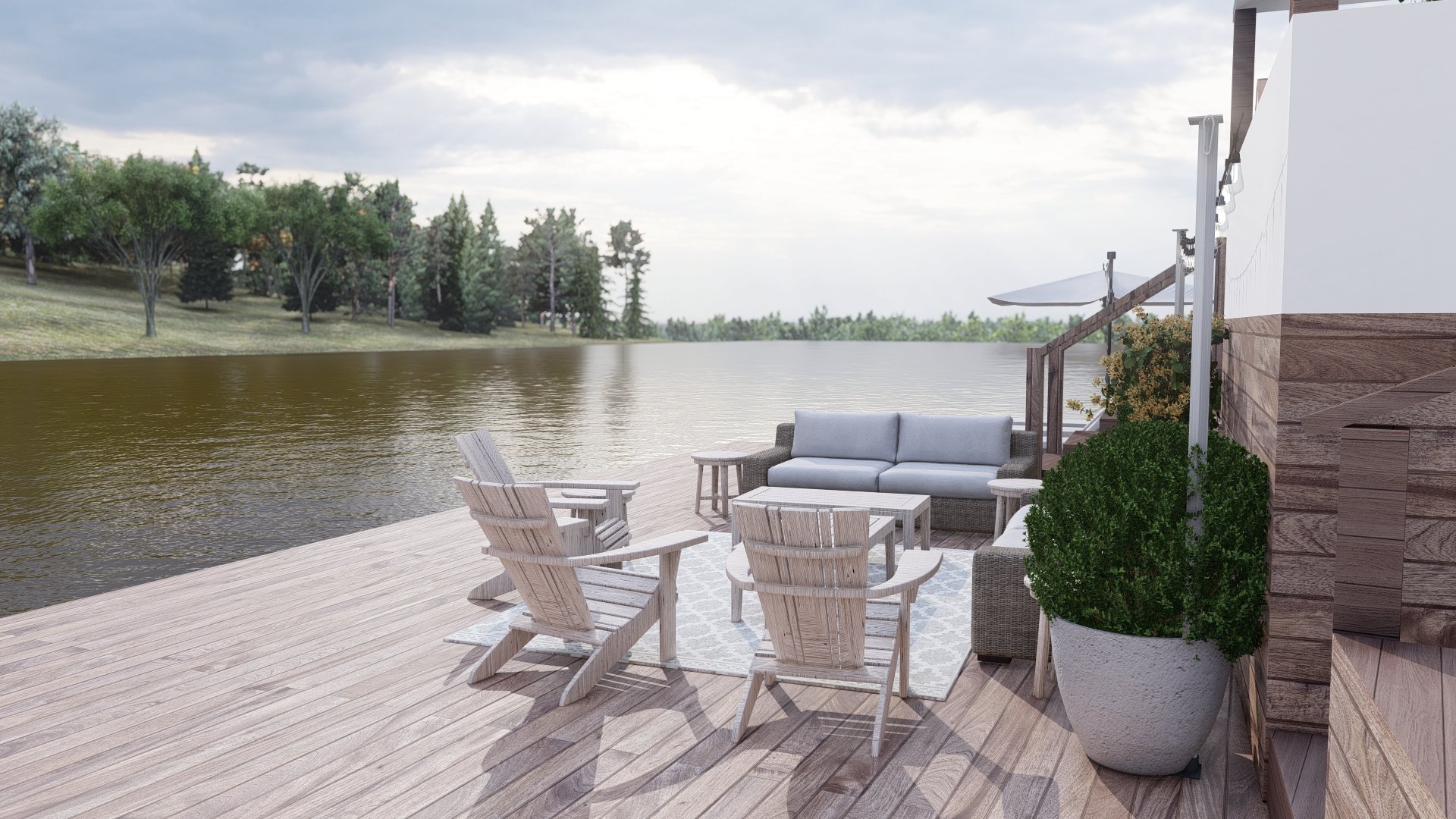 Weathered lakeside deck with teak adirondack chairs and Abaco sofa.