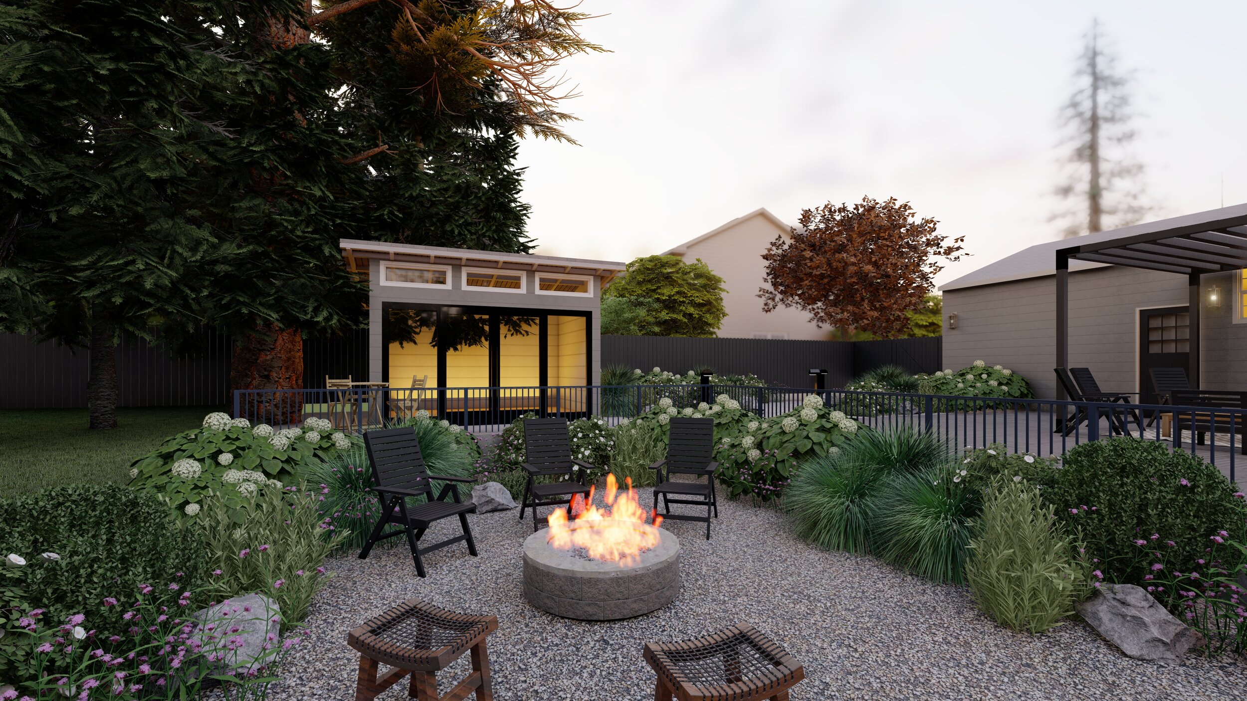 Small backyard with gravel seating area and fire pit next to an ADU