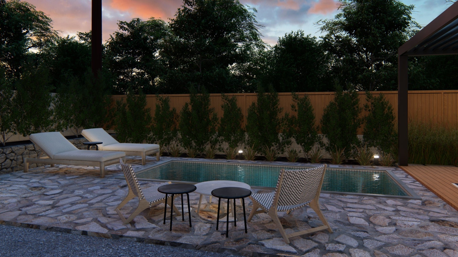 Two low-slung, columnar lights tuck into a poolside planting bed, casting a low glow for calm evenings on the pool deck.
