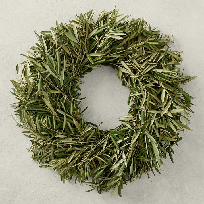 08                                   Olive Wreath - No need to diy a natural wreath—add a touch of texture to your door or exterior walls with a wreath handcrafted of fresh California-grown olive branches from Williams Sonoma. The wreath will arrive fresh and fragrant, dry beautifully, and last for months. SHOP NOW >