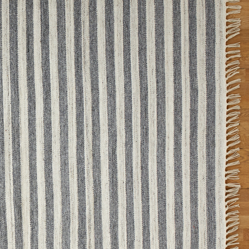 02                                 Heathered Stripe Outdoor Rug - Add a fresh perspective to your yard with a rug from Yardzen’s furniture partner, Rejuvenation. Made from 100% recycled materials, and water-resistant, this classic handcrafted blue and white pattern will look great in your yard this spring and summer.SHOP NOW >